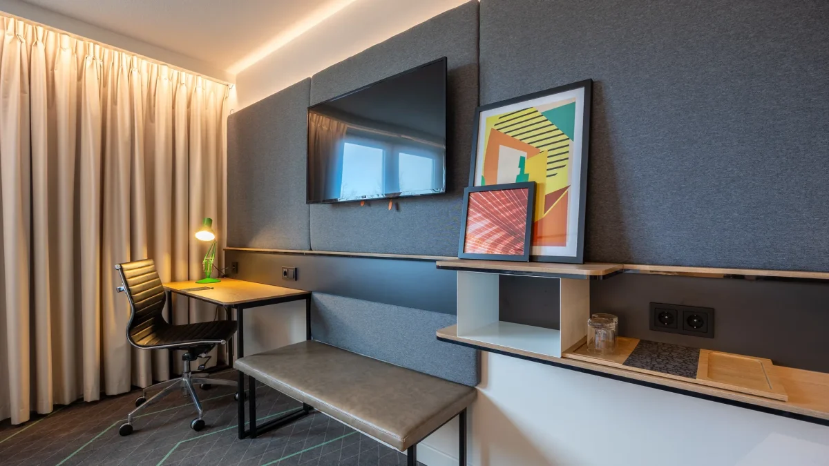Work space with a television and seating in the room